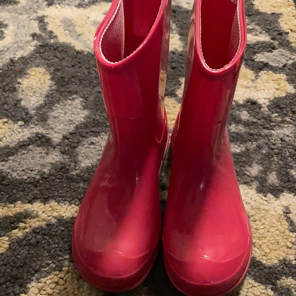 Pink rain boots